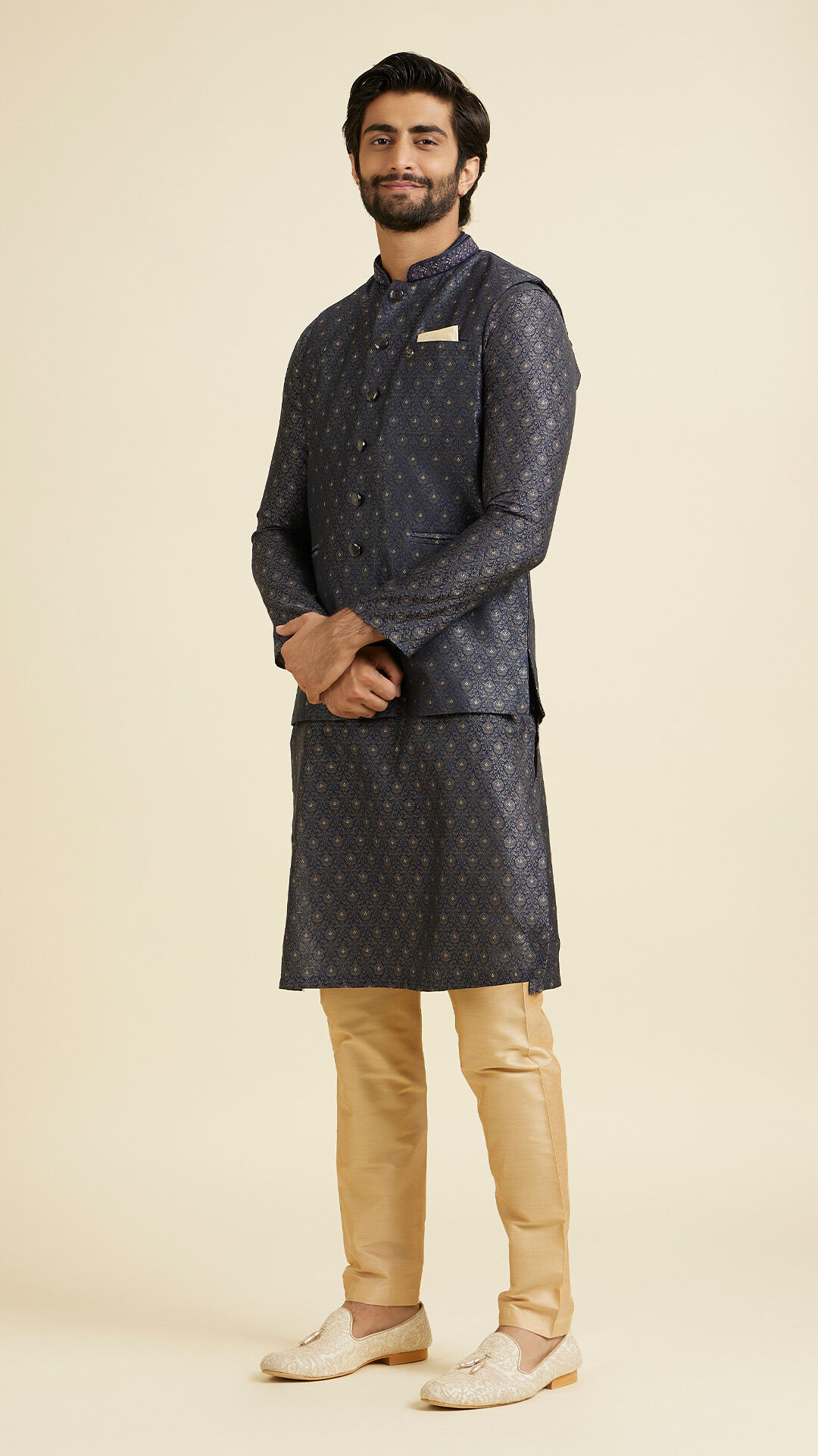 Men wearing navy blue printed kurta jacket set